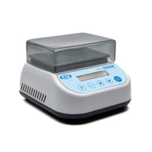 Scientific laboratory scale with digital display on a white background