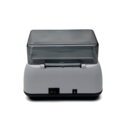 Gray machine with a transparent lid on a white background